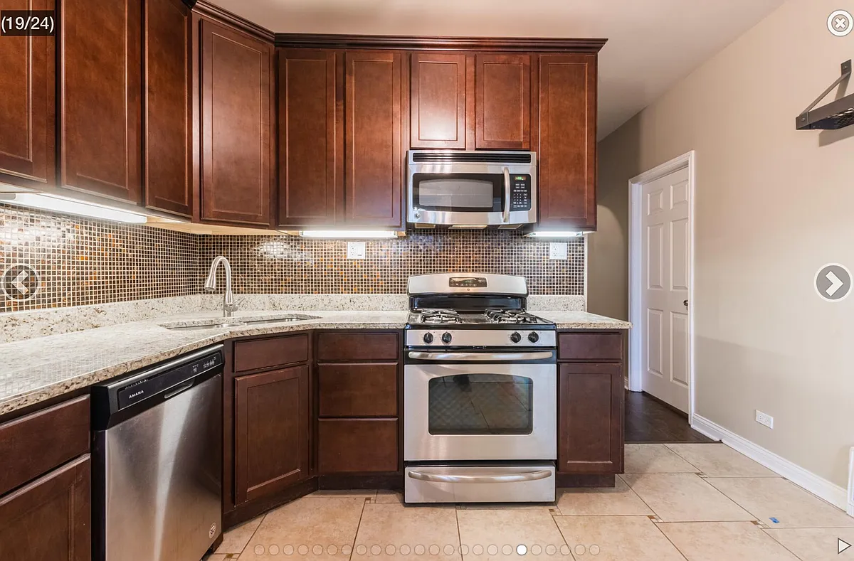 Building Photo - 4453 N Laramie Ave #2