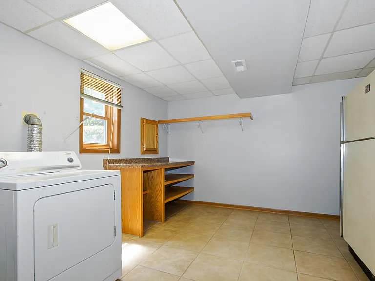 7745 Woodstock Dr — Photo 12