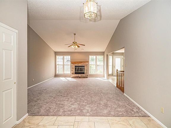1970 Royal Heir Drive - The entry way, with an over-sized coat closet, welcomes you into the spacious family room with vaulted ceilings and lots of natural light.
