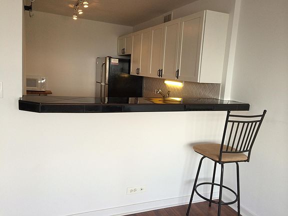 Look into kitchen with appliances