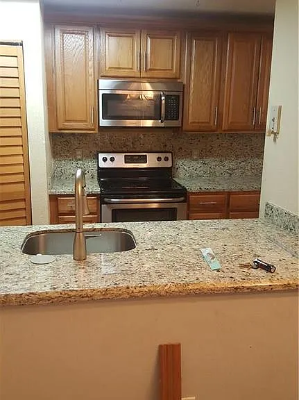 10035 Winding Lake Rd #102 — Photo 1