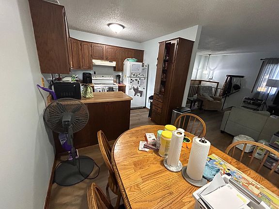 Dining room leading to kitchen