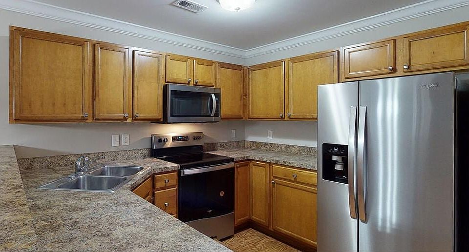Full sized side by side refrigerator