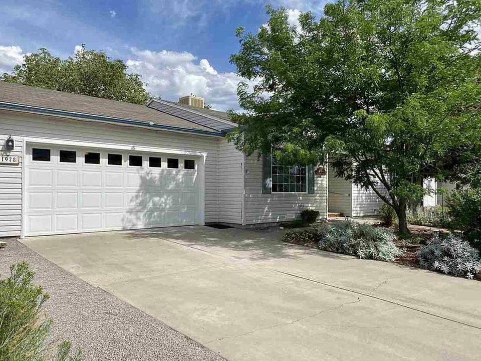 Front of house and garage.