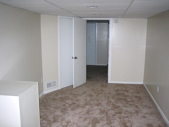 downstairs family room into 3rd bedroom