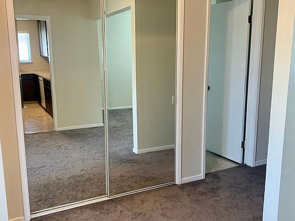 Entrance hall looking at full length closet