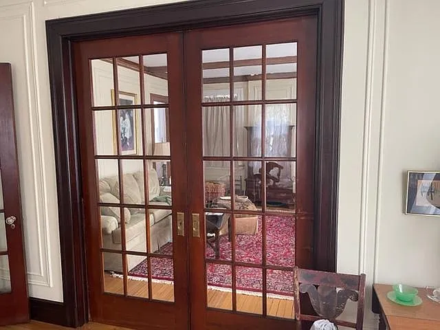 French pocket doors between the dining room and living rooms.
