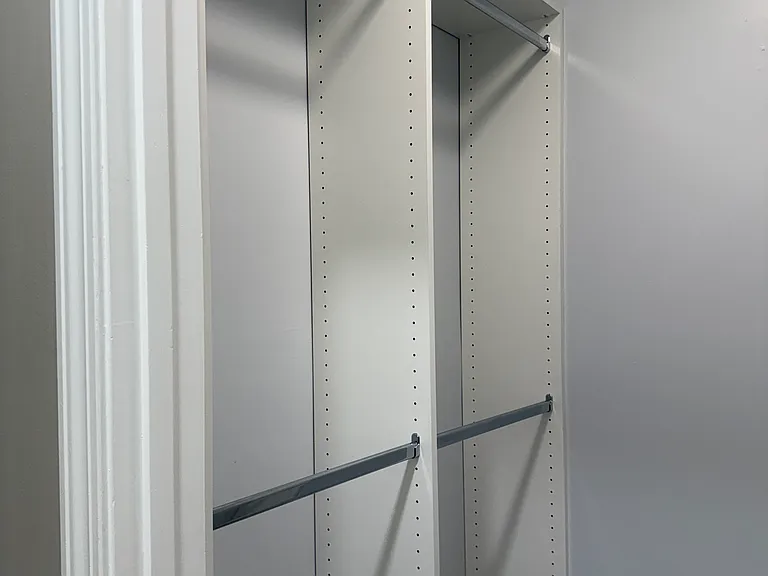 Updated closet - one side is for double hang and the other is single hang.