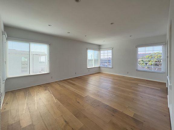 Living Room with lots of light and a French door that opens out to your private balcony