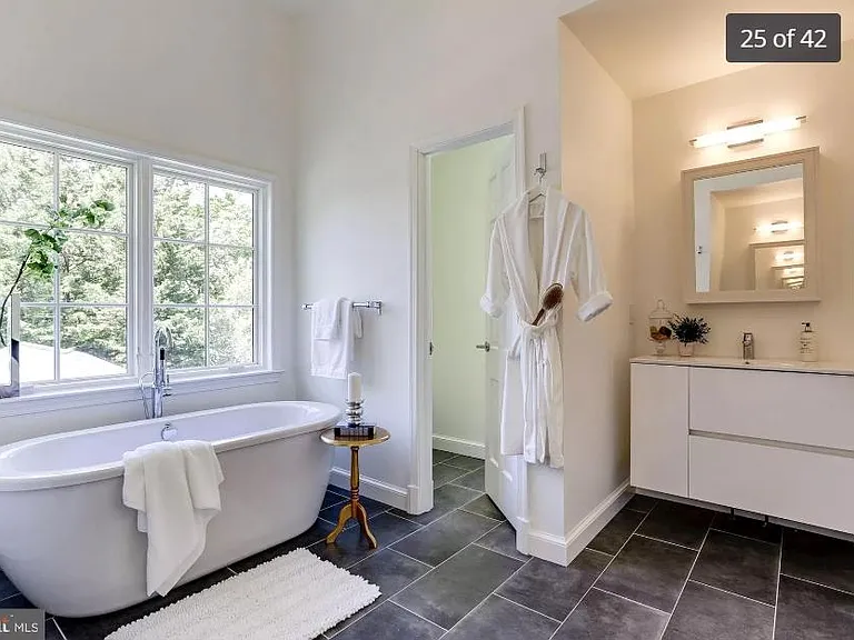 Renovated master ensuite bath with two separate vanities