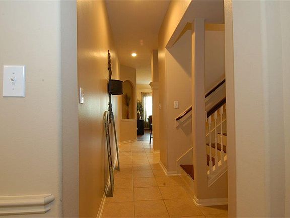 Hallway that leads to the Family Room and Master Suite