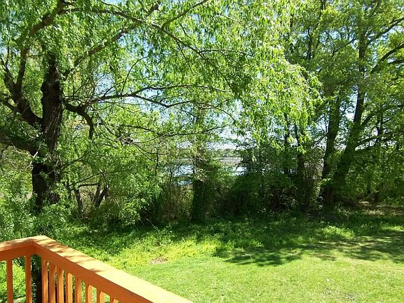 Back Deck View of Yard and Bush River