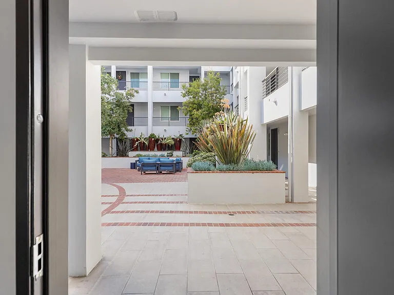 Lower LevelApartment Entrance off of Interior Courtyard