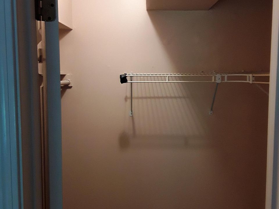walkin closet in bedroom