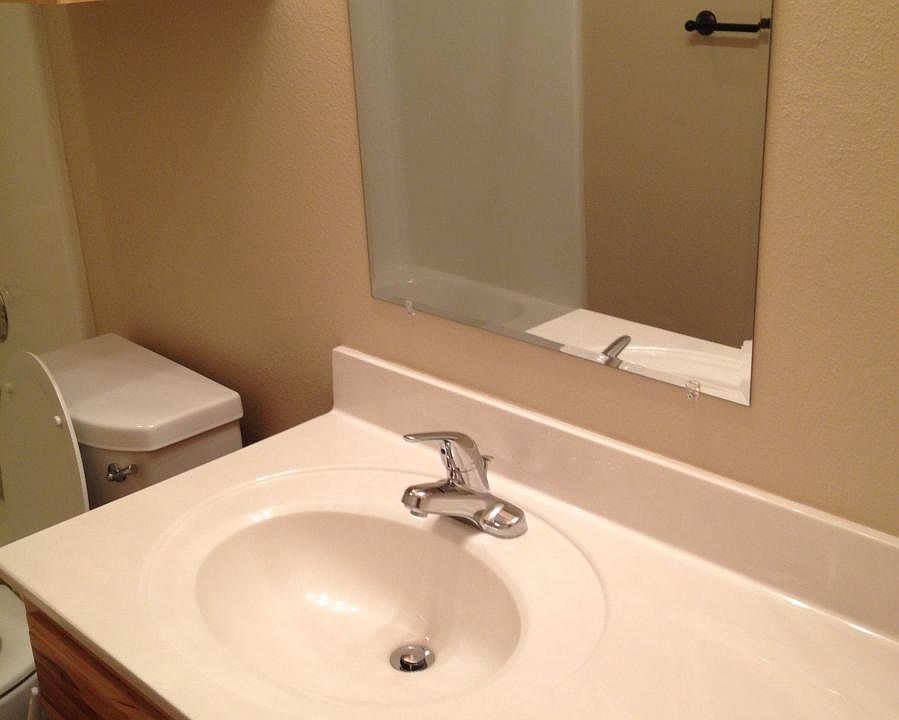All the bathrooms in these apartments are the same.