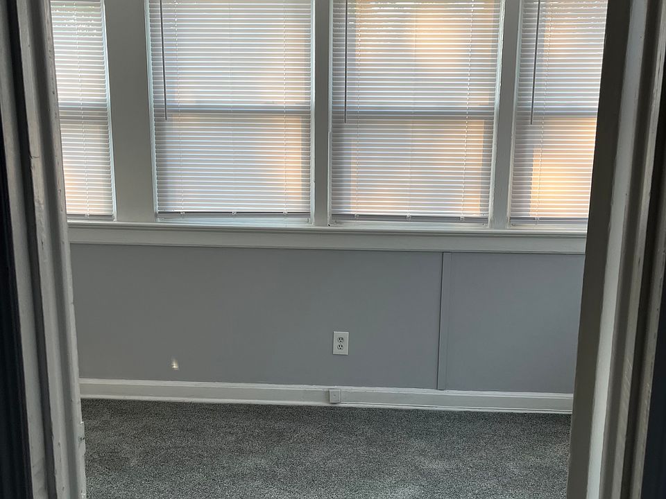 Entry door into possible office/play room