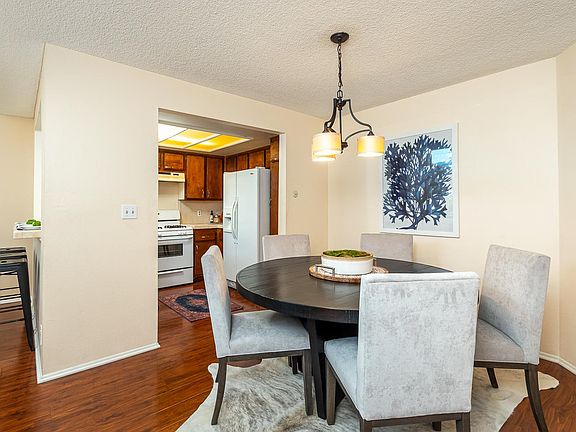 This condo is staged and will be delivered unfurnished except will furnish gas range, refrigerator and washer and dryer.