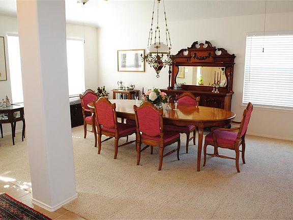 The formal living room and formal dining area.