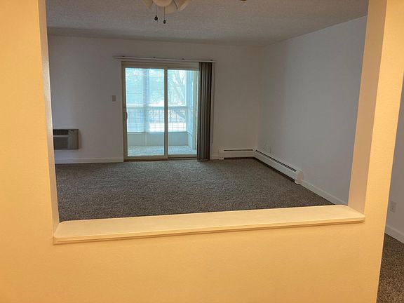 Living room/glass & screen enclosed lanai.