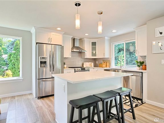Newly remodeled kitchen with bar for 3.