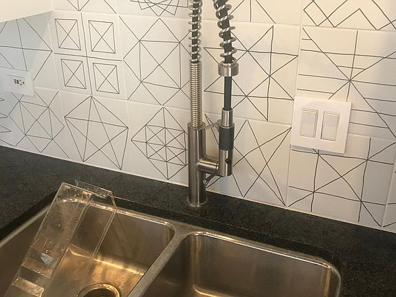 Kitchen sink with food disposal