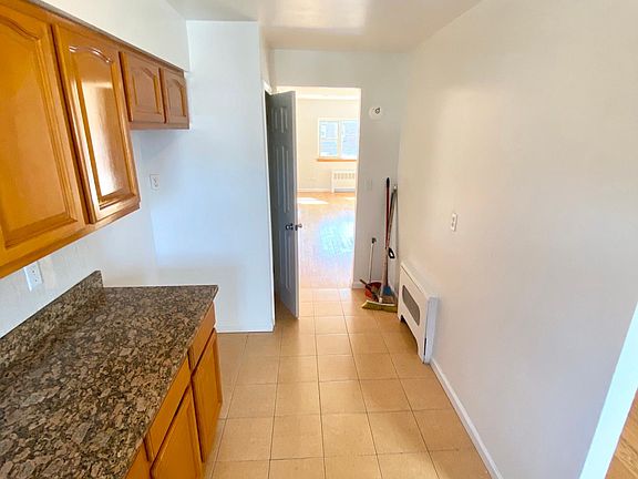 tons of space! Refridgerator not delivered yet (will be stainless) plus pantry