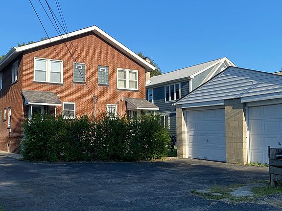 View facing East from the alley. 906 is on the left, This includes one space in the garage, on the left.
