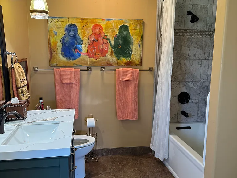 extra large soaking tub in the bathroom with custom marble surround