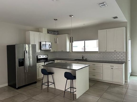 4th image of 10902 International Blvd #113