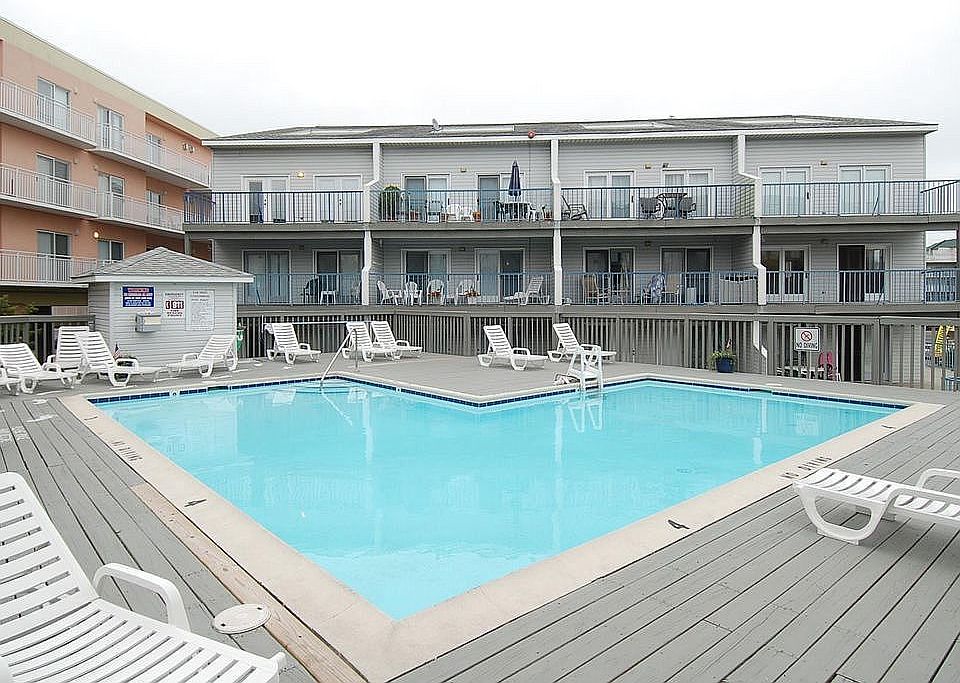 Pool, condo is to upper left