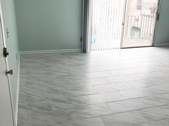 Entrance to the living room with the large balcony sliding d