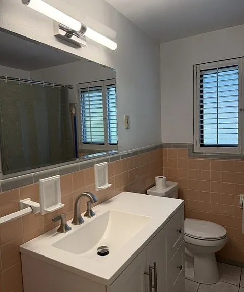 Full Bath 1- Just renovated in July 2026 with brand new vanity, sink, light, mirror, faucet, toilet, bath tub etc. newly painted wall and ceiling.