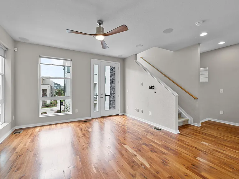 Spacious living room with blinds included