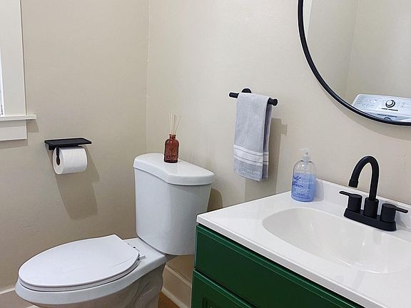 Downstairs bathroom and washer/dryer room.