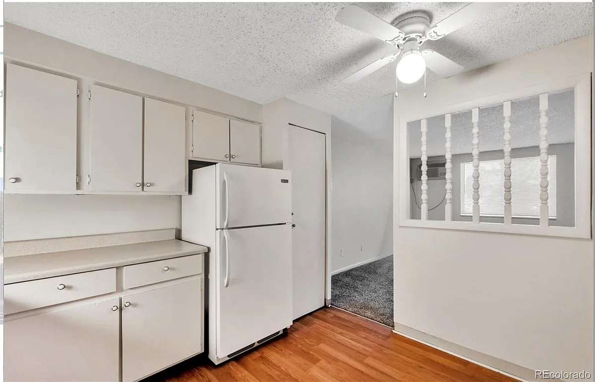Building Photo - 8822 E Florida Ave #112