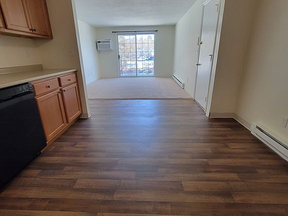 2 bed - Kitchen looking toward entryway and living room.