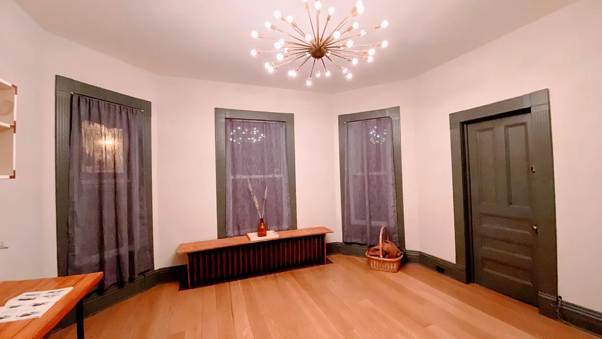 Photo 2 of 49 - 28 New St #1 - Catskill, NY Living Room Looking Front with Apartment Entrance Door (r) - 28 New St #1