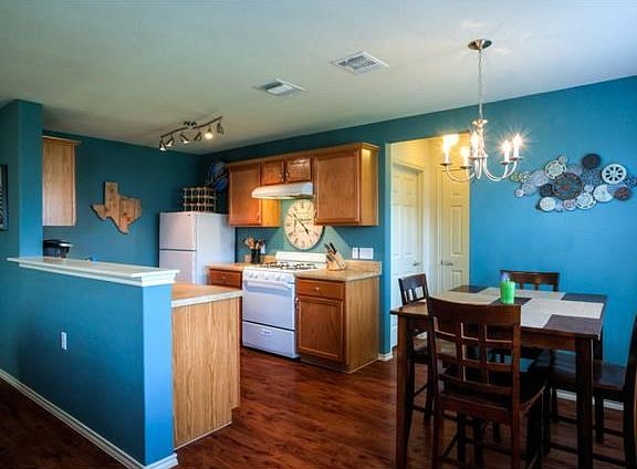 Open concept kitchen, living, and dining room area. Great for hosting friends or family members.