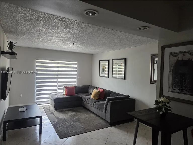 4265 NW South Tamiami Canal Dr #1-208 — Photo 4