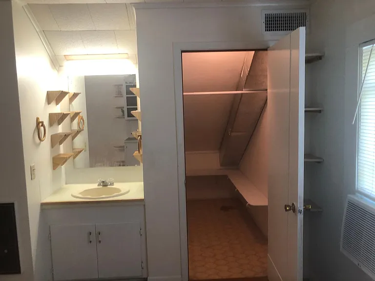 Wash basin and closet in second bedroom on the second floor