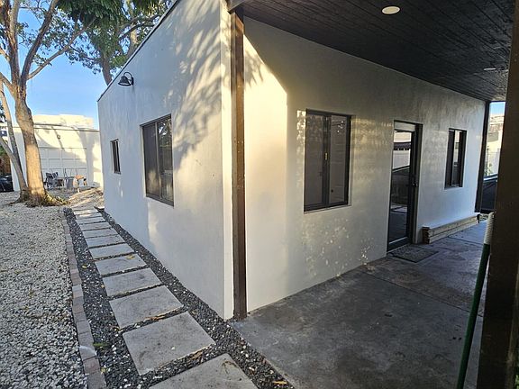 Well lit, tidy and private house enterance.