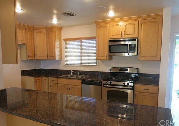 3rd image of 10150 Woodley Ave