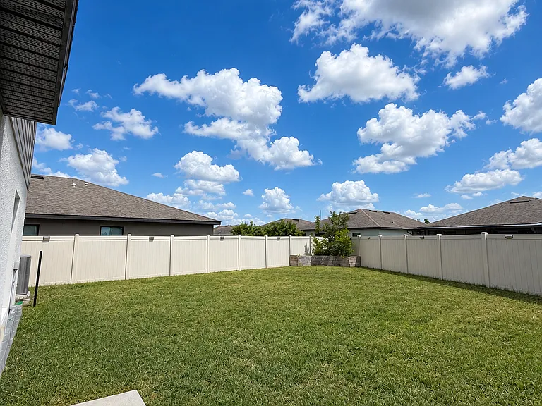 Large fenced in backyard