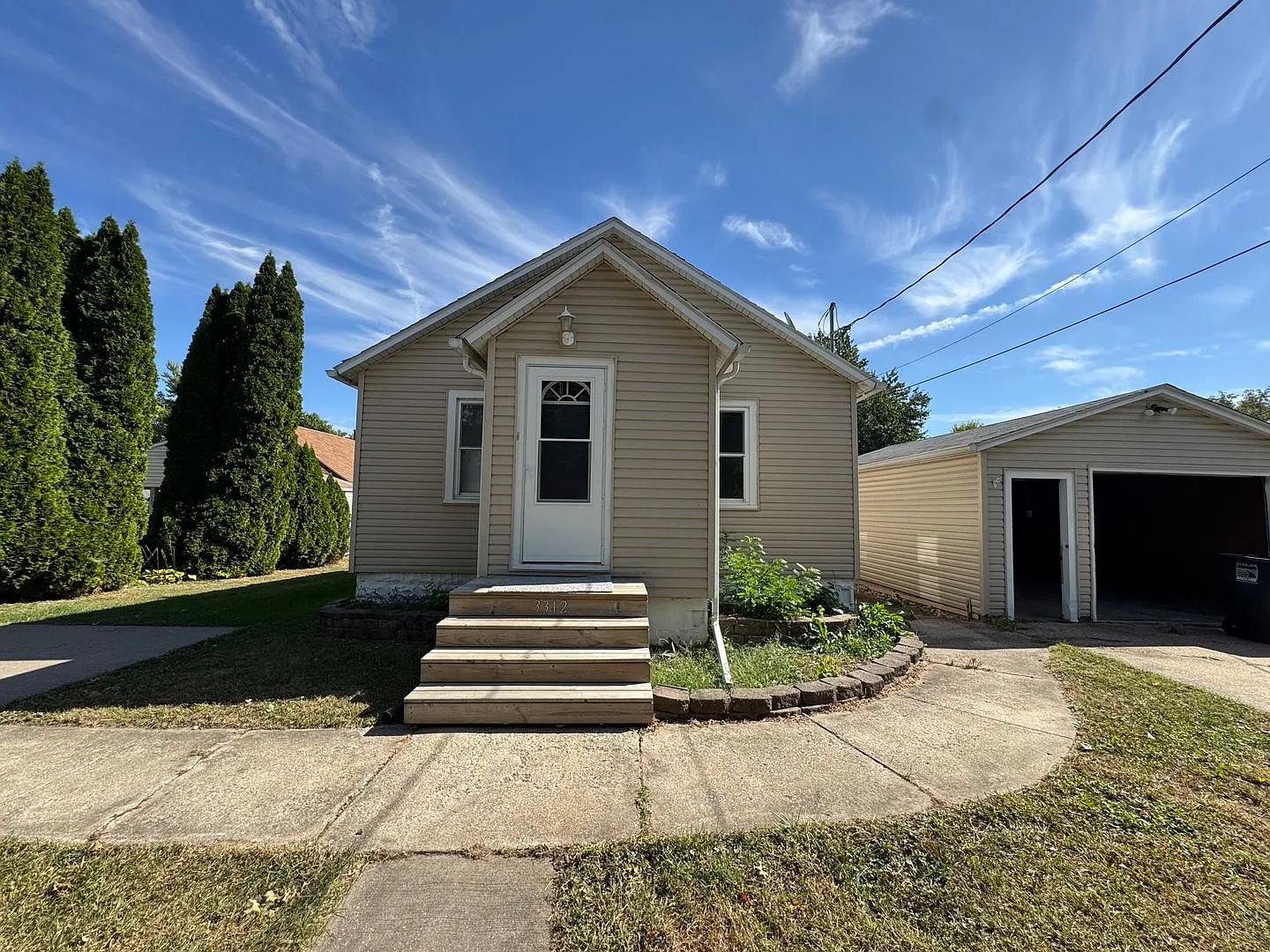 Updated 2-Bedroom Home in Moline | Huge Fenced Yard, Garage & Screened Patio — Photo 1
