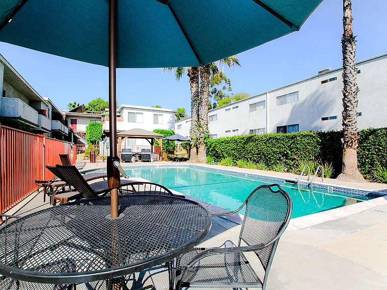 View of shaded pool seating area.