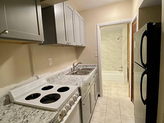 Kitchen has all new cabinets and counters, pantry is on the right before the refrigerator.
