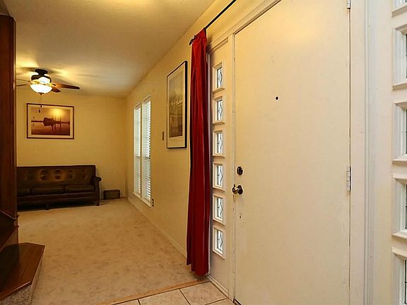 Lovely decorative sidelights frame the front entry door and add additional brightness to this home.