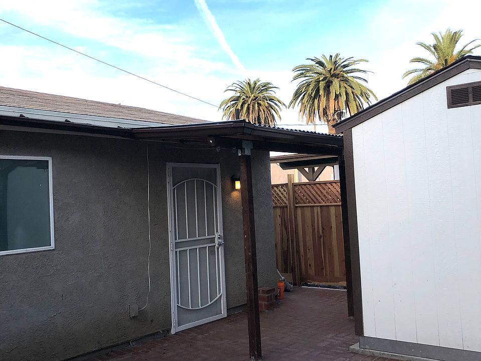 Potted plants corner looking towards front door. Facing North East.