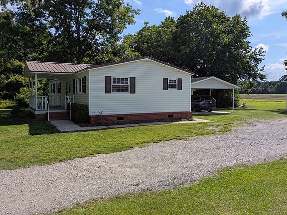 View from driveway of carport