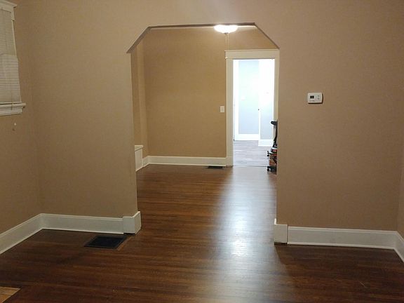 Living room looking into dining room.